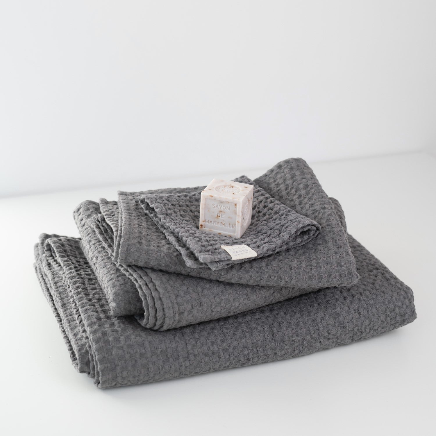 Dark grey linen-cotton waffle towel set folded together