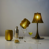 Sculptural pleat lamp for bedside or console lighting