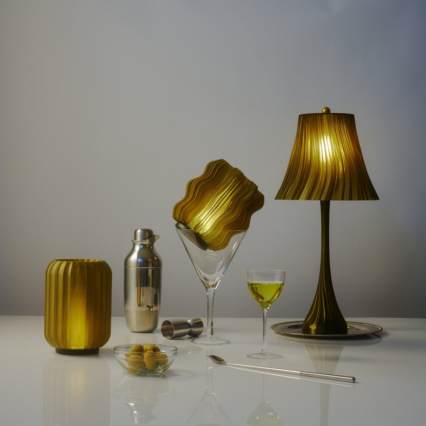 Sculptural pleat lamp for bedside or console lighting