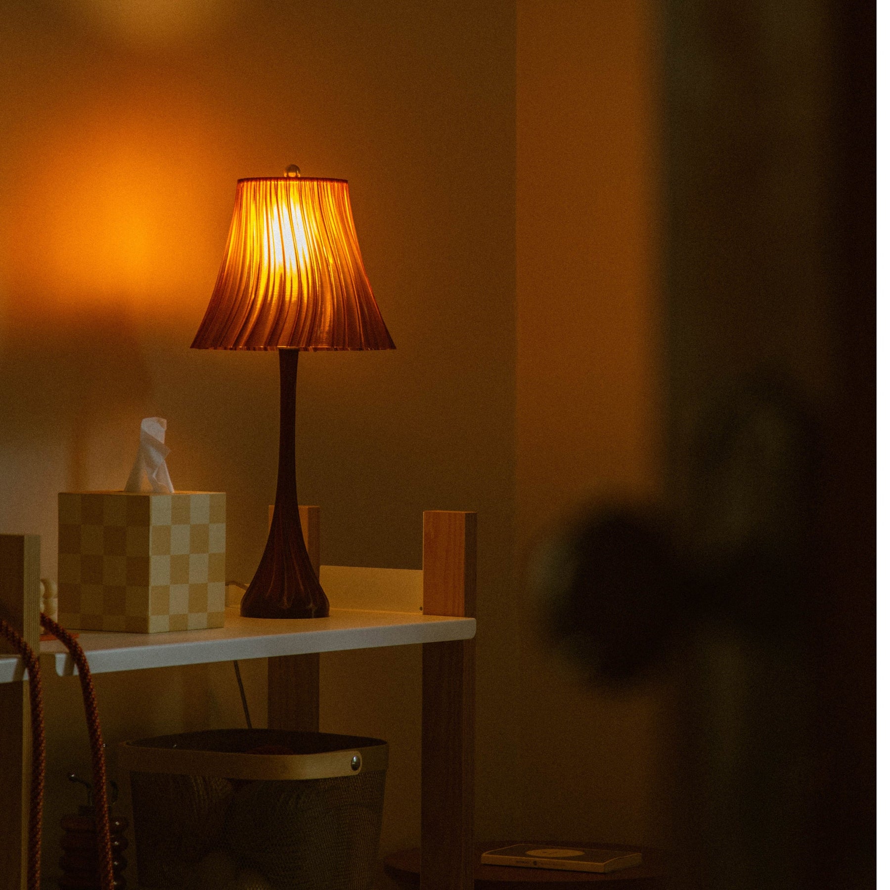 Pleat table lamp for quiet shelf or nightstand lighting