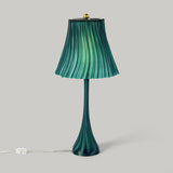 Emerald Pleat table lamp isolated product view.