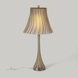 Smoke Pleat table lamp isolated product view.