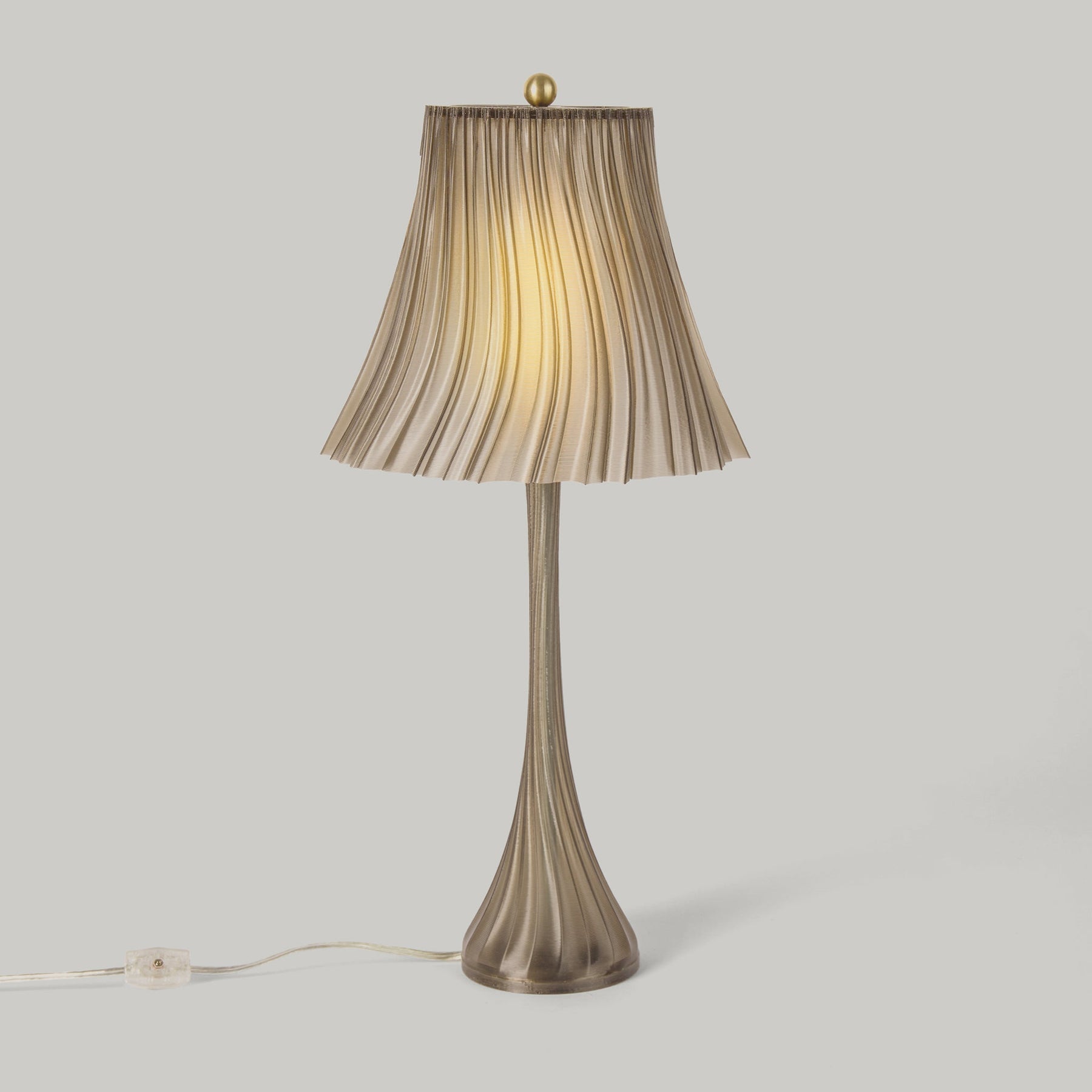 Smoke Pleat table lamp isolated product view.