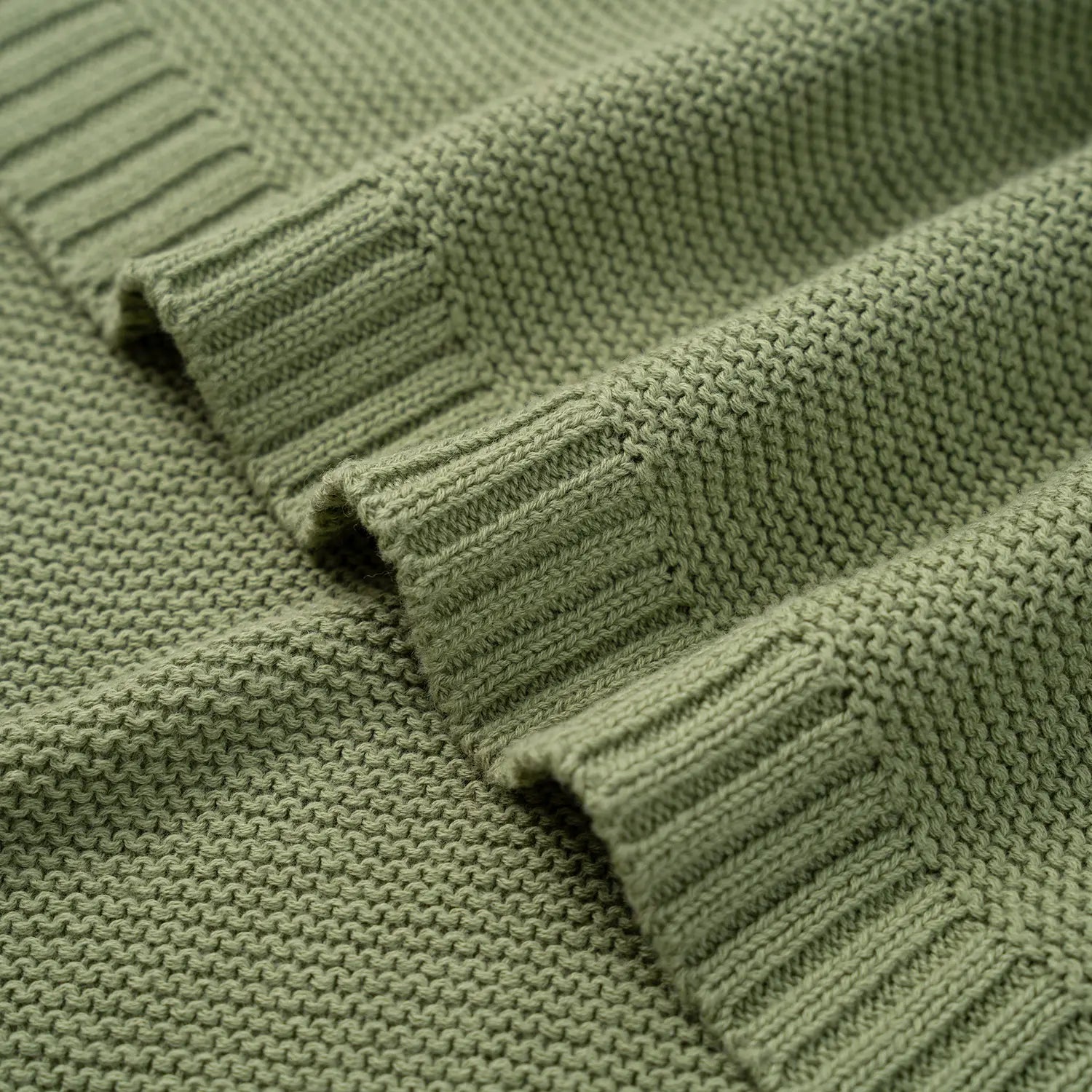 Cotton knit baby blanket in calm sage color