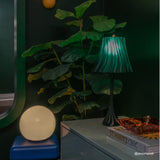 Pleat table lamp photographed in a real-home setting.
