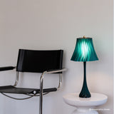 Pleat table lamp photographed in a real-home setting.