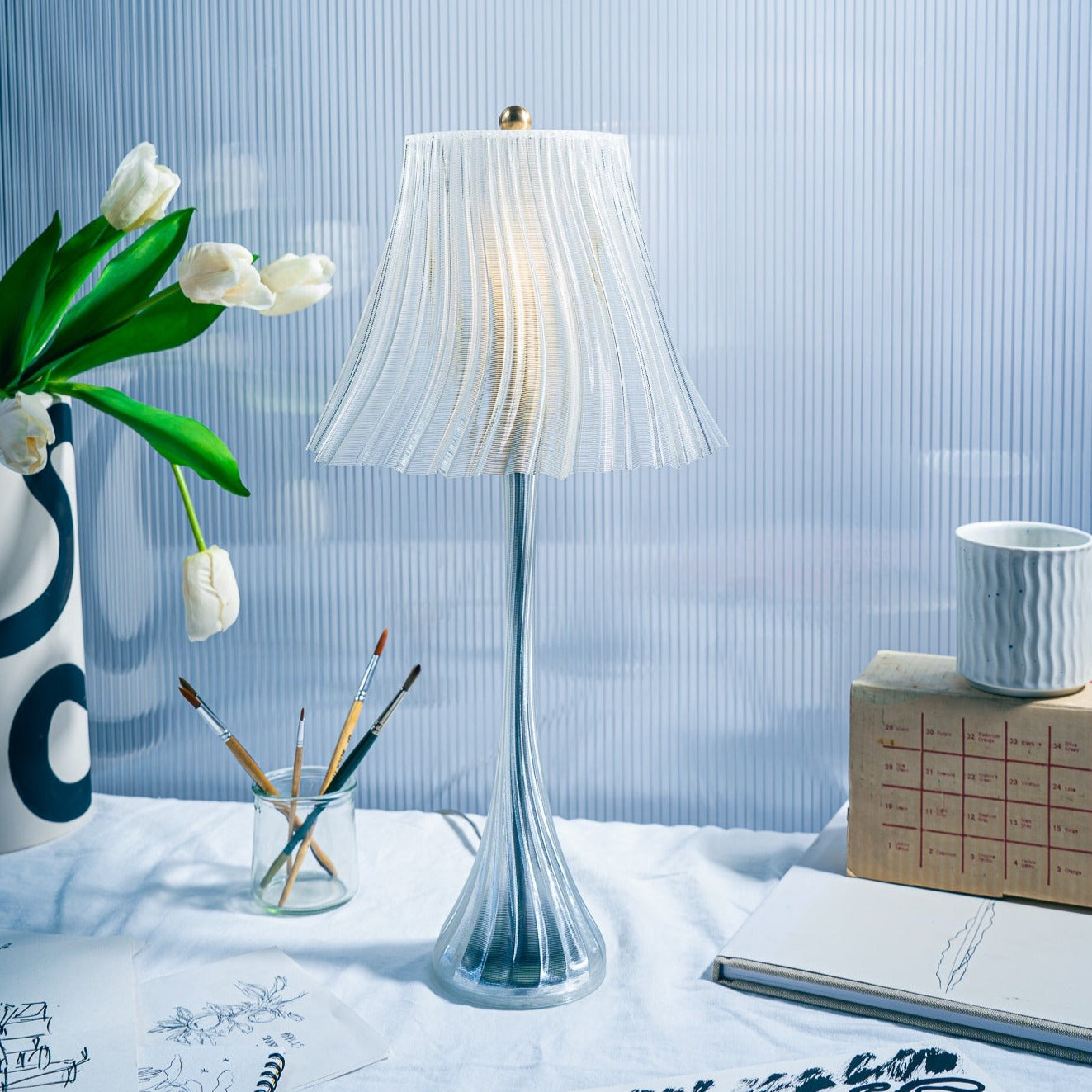 Clear Pleat table lamp detail view.