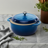 Blue enamel Dutch oven styled for family kitchen cooking